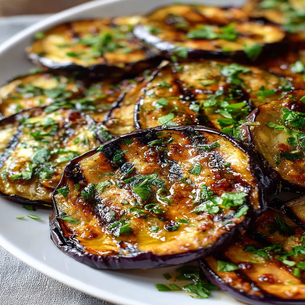 Grilled eggplant, smoky flavor, charred edges, savory, delicious, healthy side dish