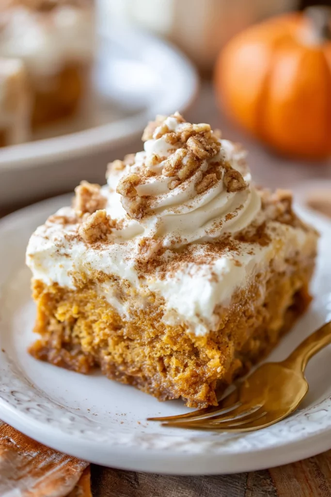 pumpkin poke cake, moist, spiced, decadent, fall dessert, cream cheese frosting